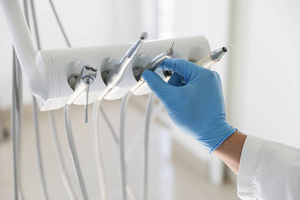 Professional Root Canal Treatment technician working in Beaverton, MI